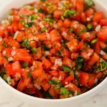 Pico de gallo in white bowl